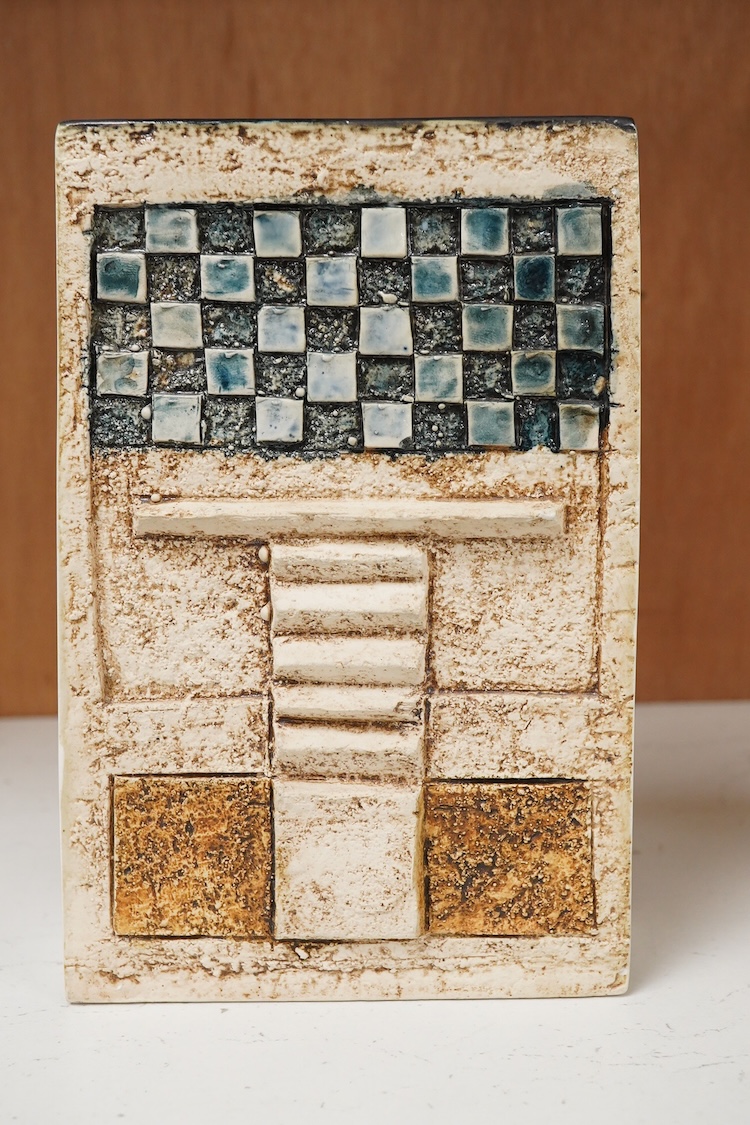 A Troika vase by Linda Taylor, decorated in relief with an abstract design, signed to the base, 17cm high